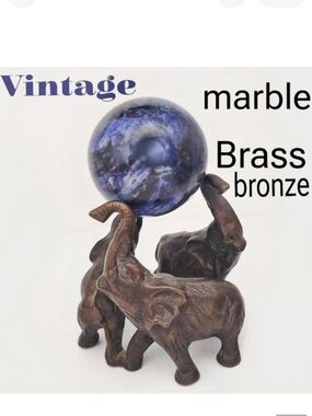 Vintage 1990s brass or bronze elephants with real marple sphere